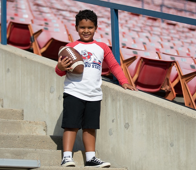 Photo of Bryce at Fresno State University's football stadium