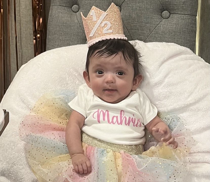 Photo of Mahria celebrating her half-month birthday