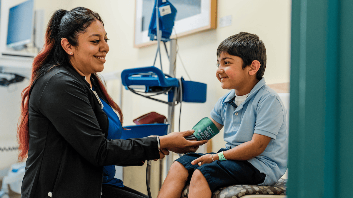 A doctor and a young boy