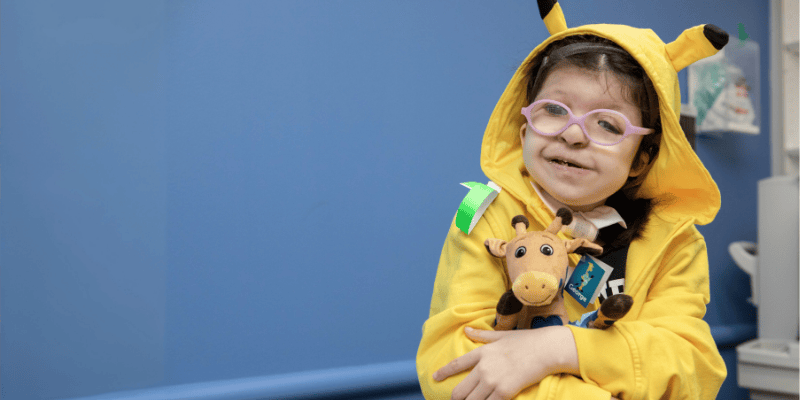 Olivia smiles during an appointment