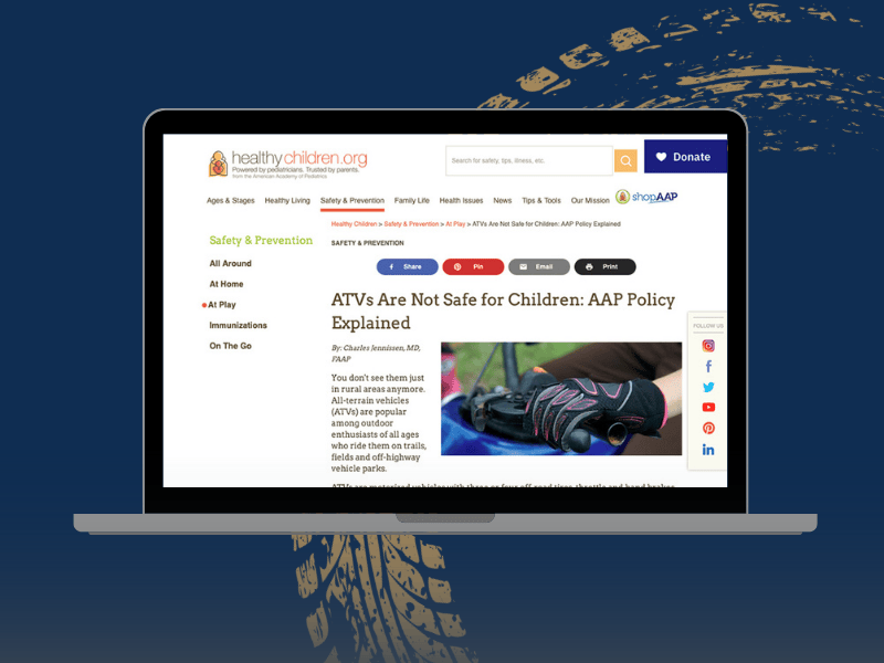 A laptop showing a screenshot of the AAP's Healthy Children website