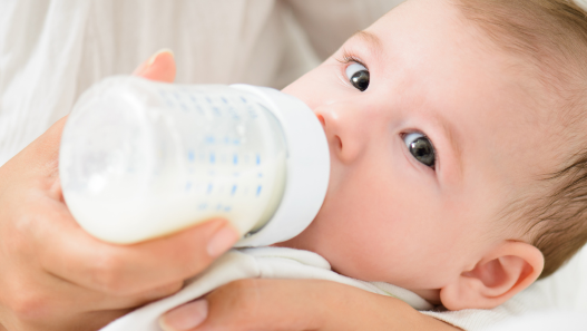 Baby taking a bottle