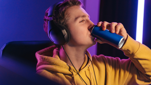 Teen drinking energy drink