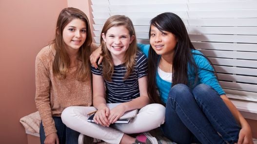 Girls smiling at the camera