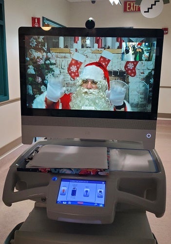 Pantalla de carrito portátil de Santa Virtual