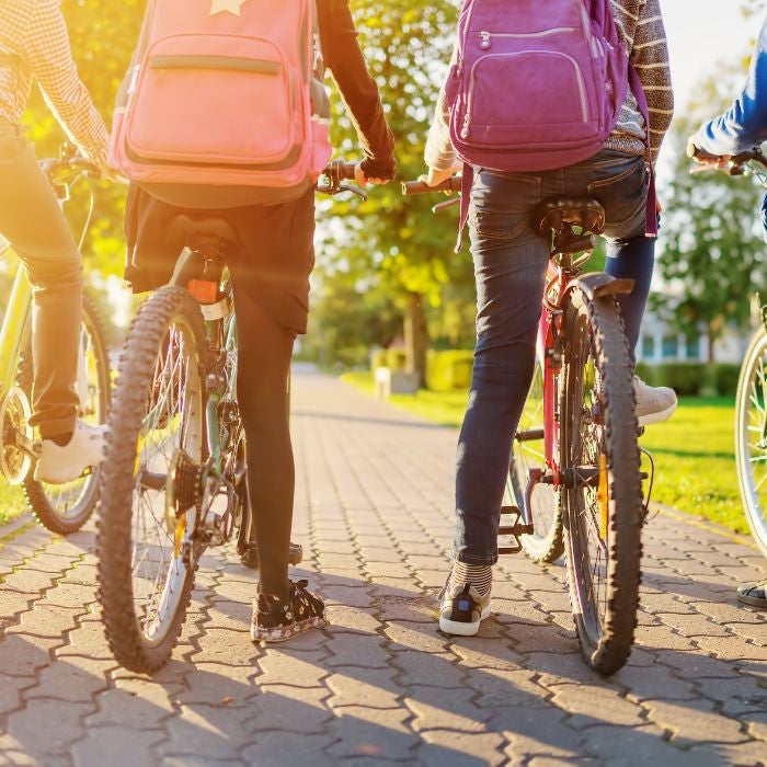 Close up of children on bikes