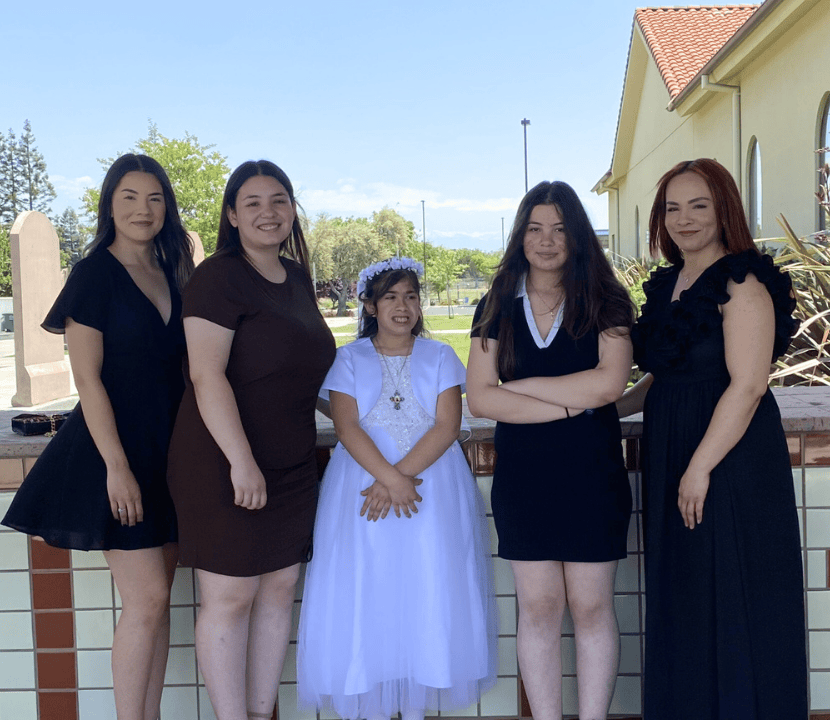 Juliette smiles with her sisters