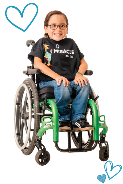 Sylus smiles in a photoshoot for Children's Miracle Network Hospitals