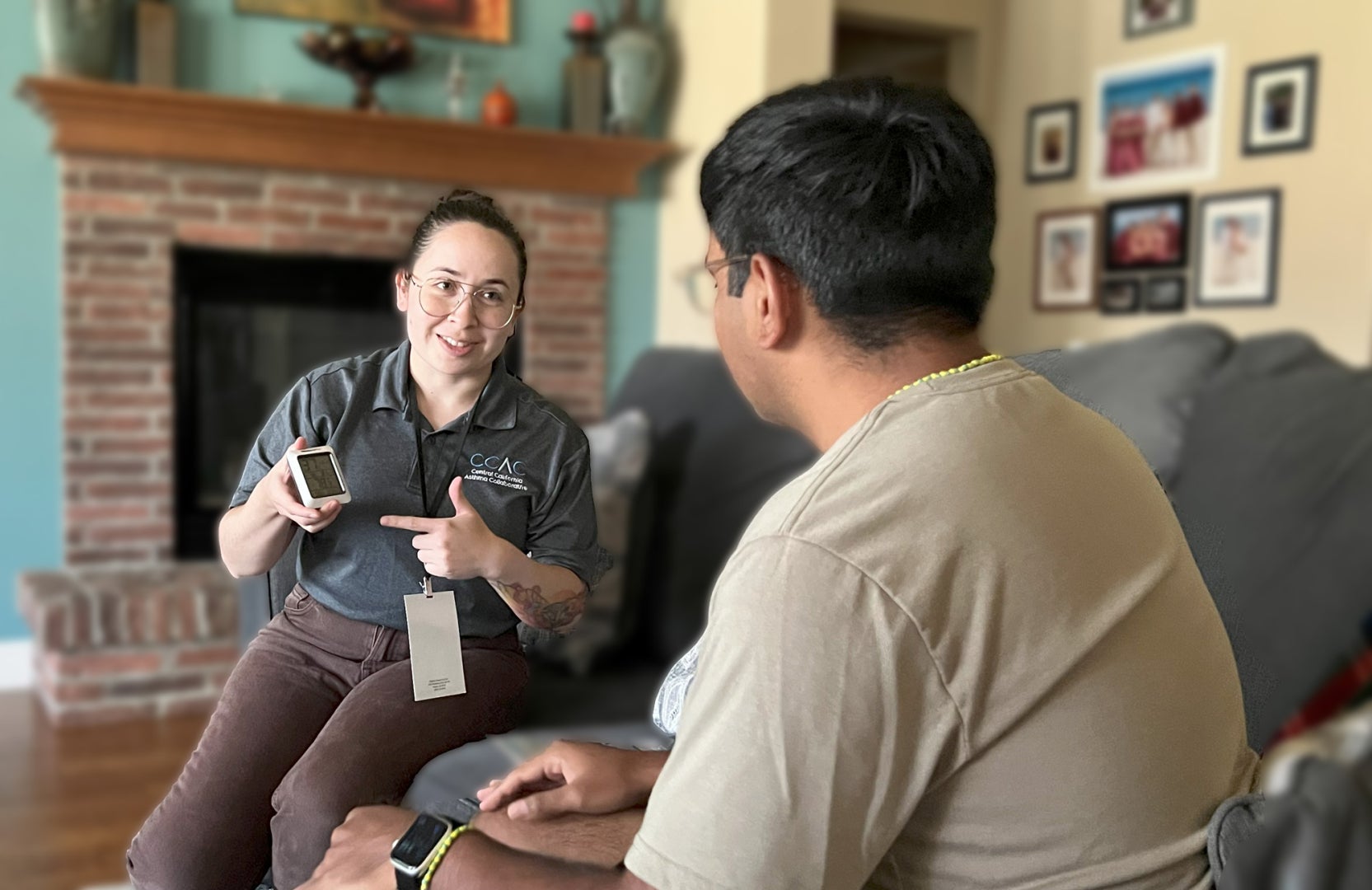A CCAC staff members consults with a community member in their home